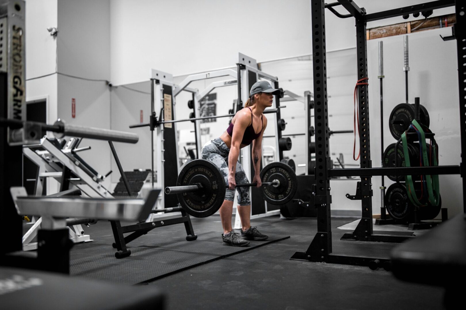 A person is lifting some weight in the gym